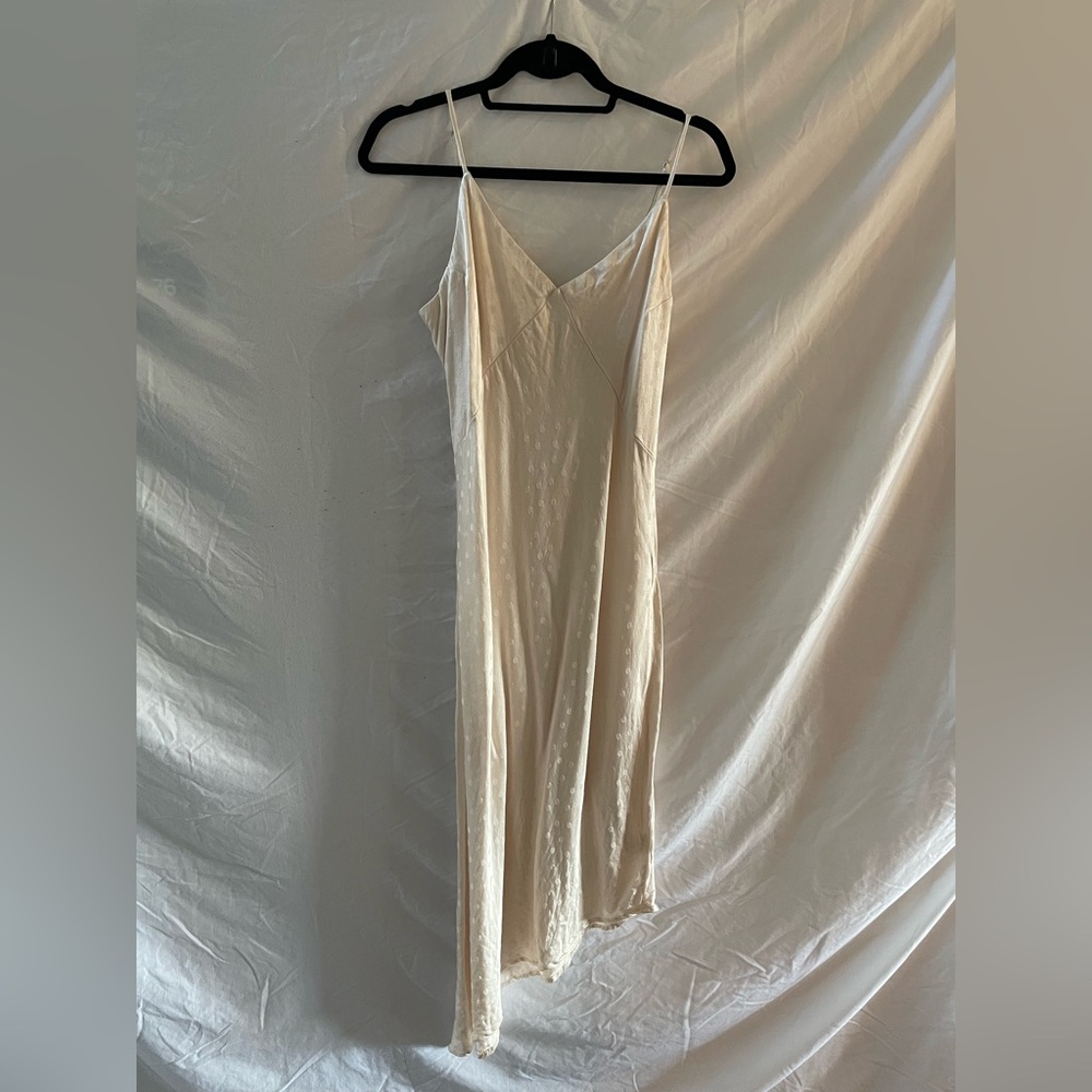 Vici Asymmetrical Slip Dress in Cream
